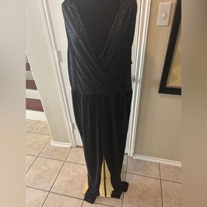Black sparkle top and black pant jumpsuit. V-Neck and a side tie